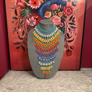 set de collar,aretes y pulsera cascada de flores